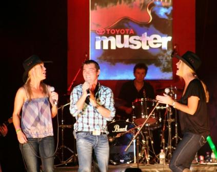 Adam Brand with The Sunny Cowgirls performing at the National Country Music  Muster.  Photo by Chrissy Layton, AusNotebook Music & Creative.